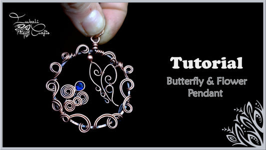 Butterfly and flower wire pendant