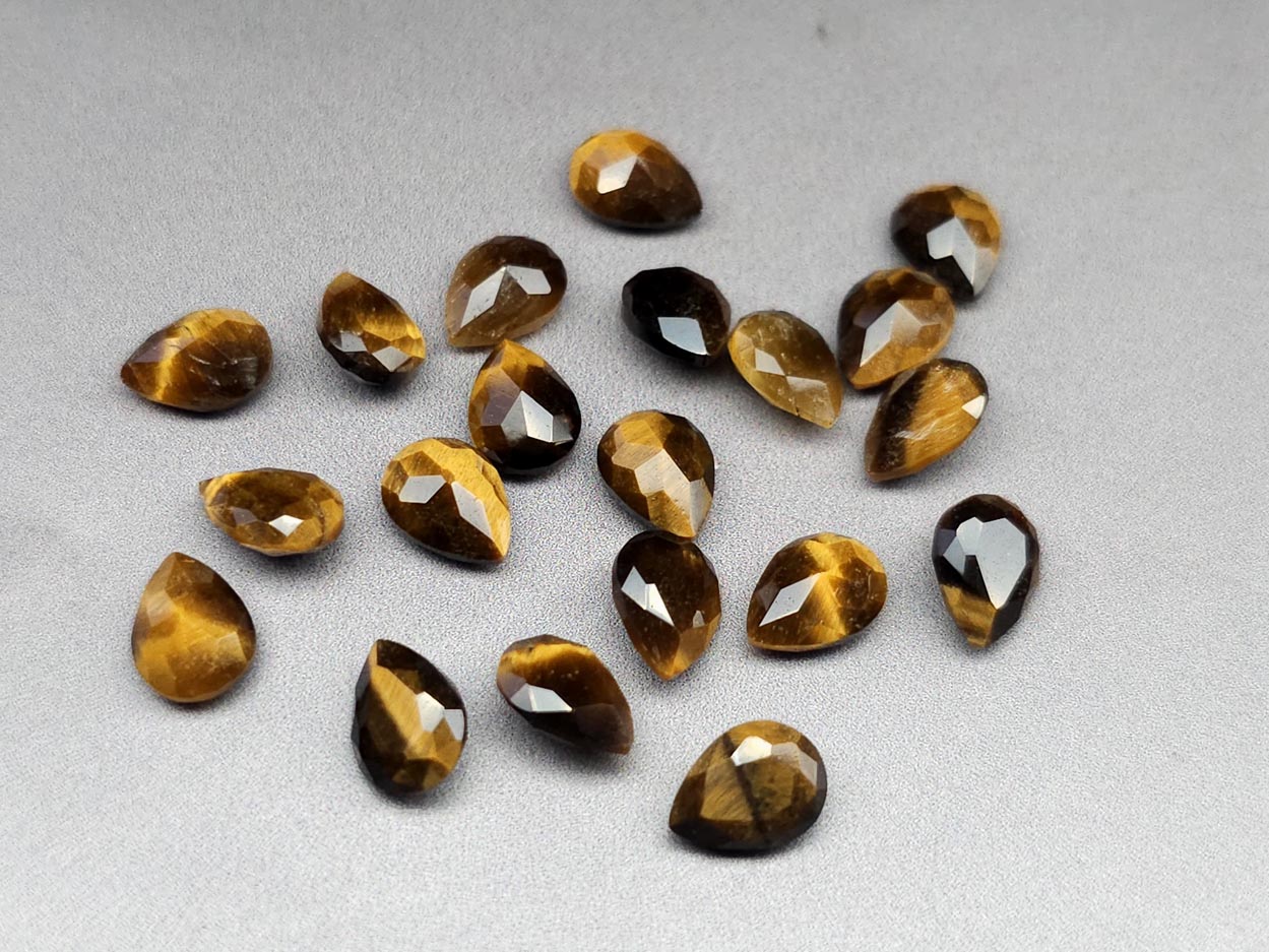 Tigers eye - faceted pear - 8 mm