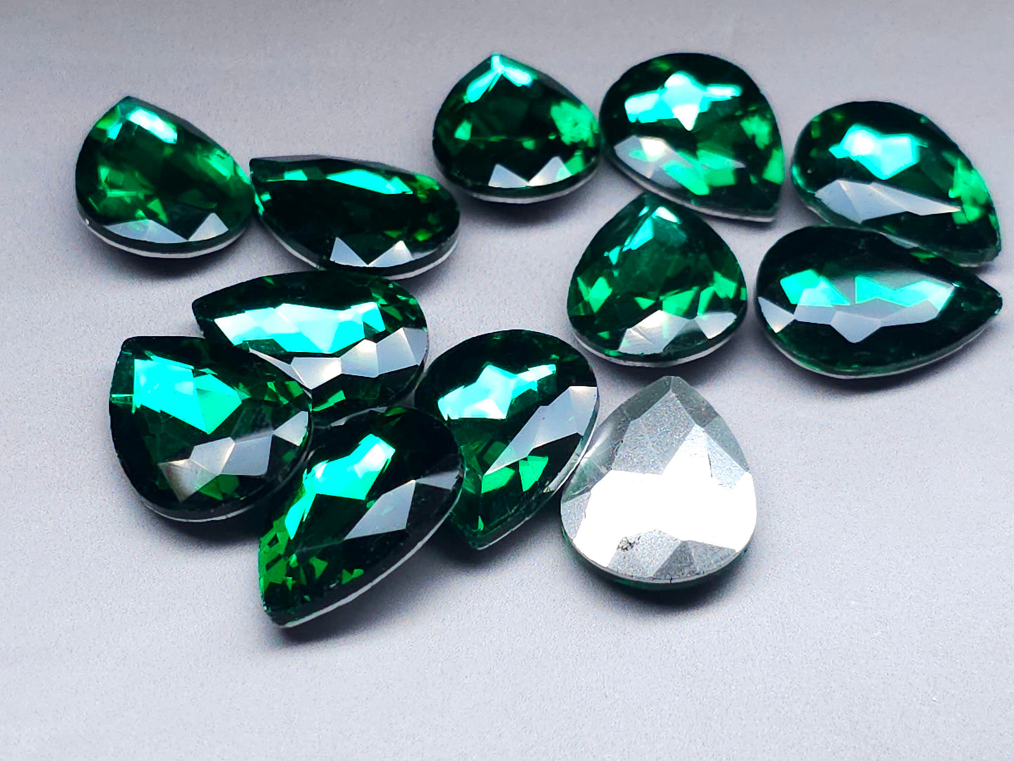 Emerald green faceted point back pear glass rhinestone