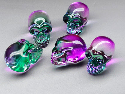 Glass skull bead 26mm pink showing shape and size reference