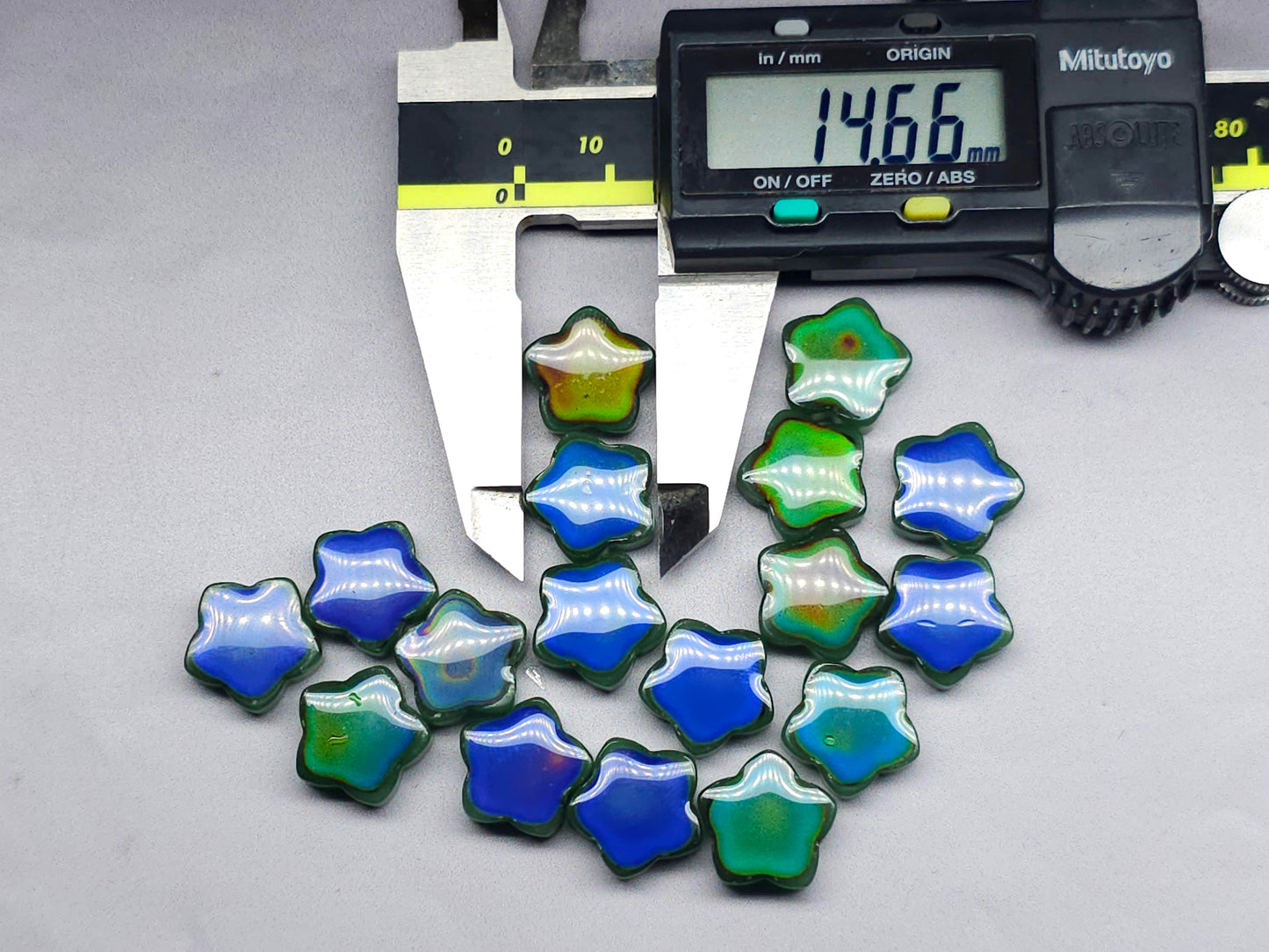 Mood stone - star beads - 14 mm - forest green