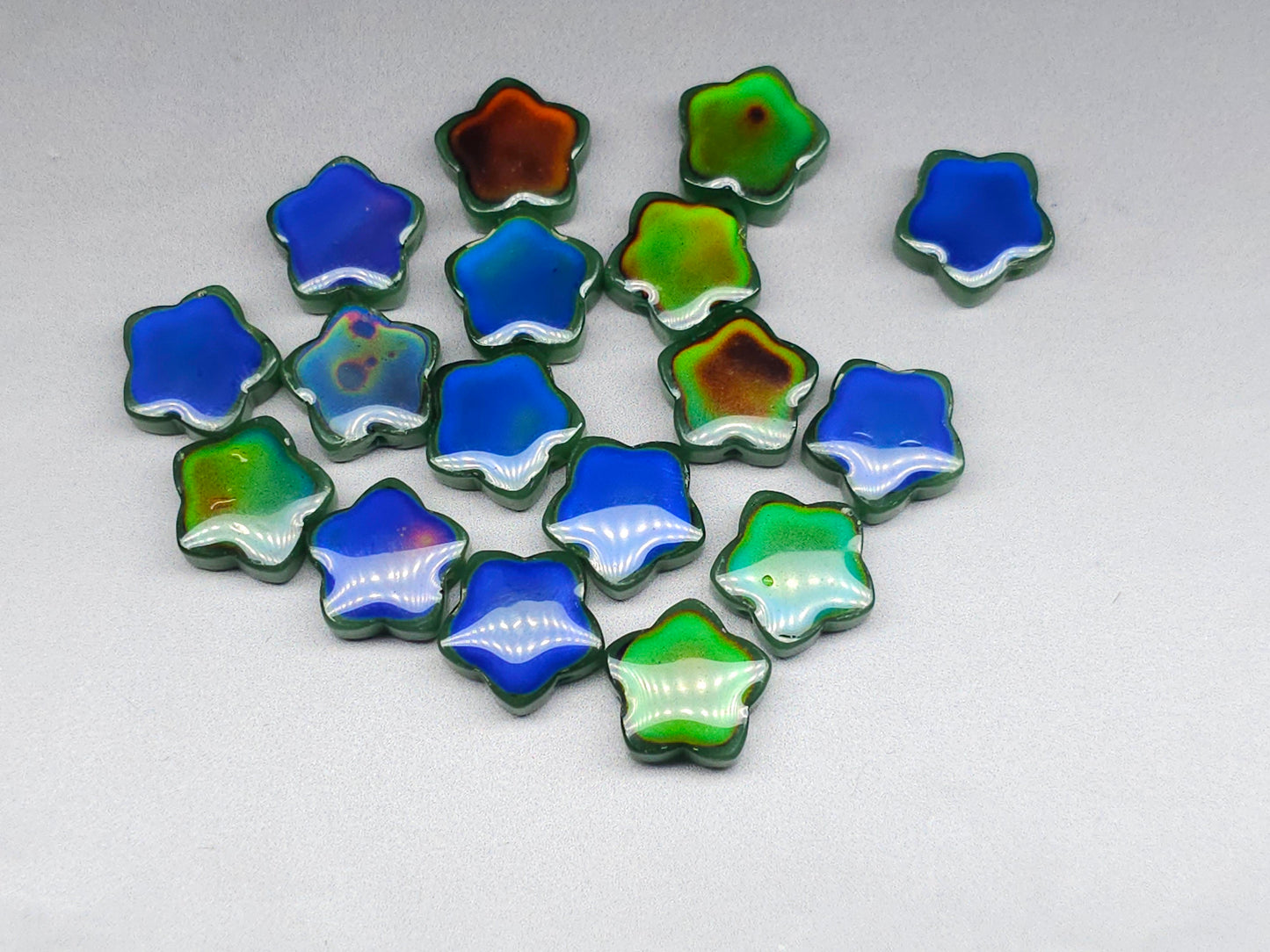 Mood stone - star beads - 14 mm - forest green