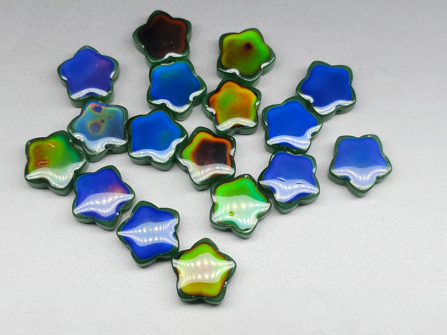 Mood stone - star beads - 14 mm - forest green