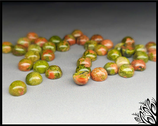 Green an d pink unakiteflatback cabochons