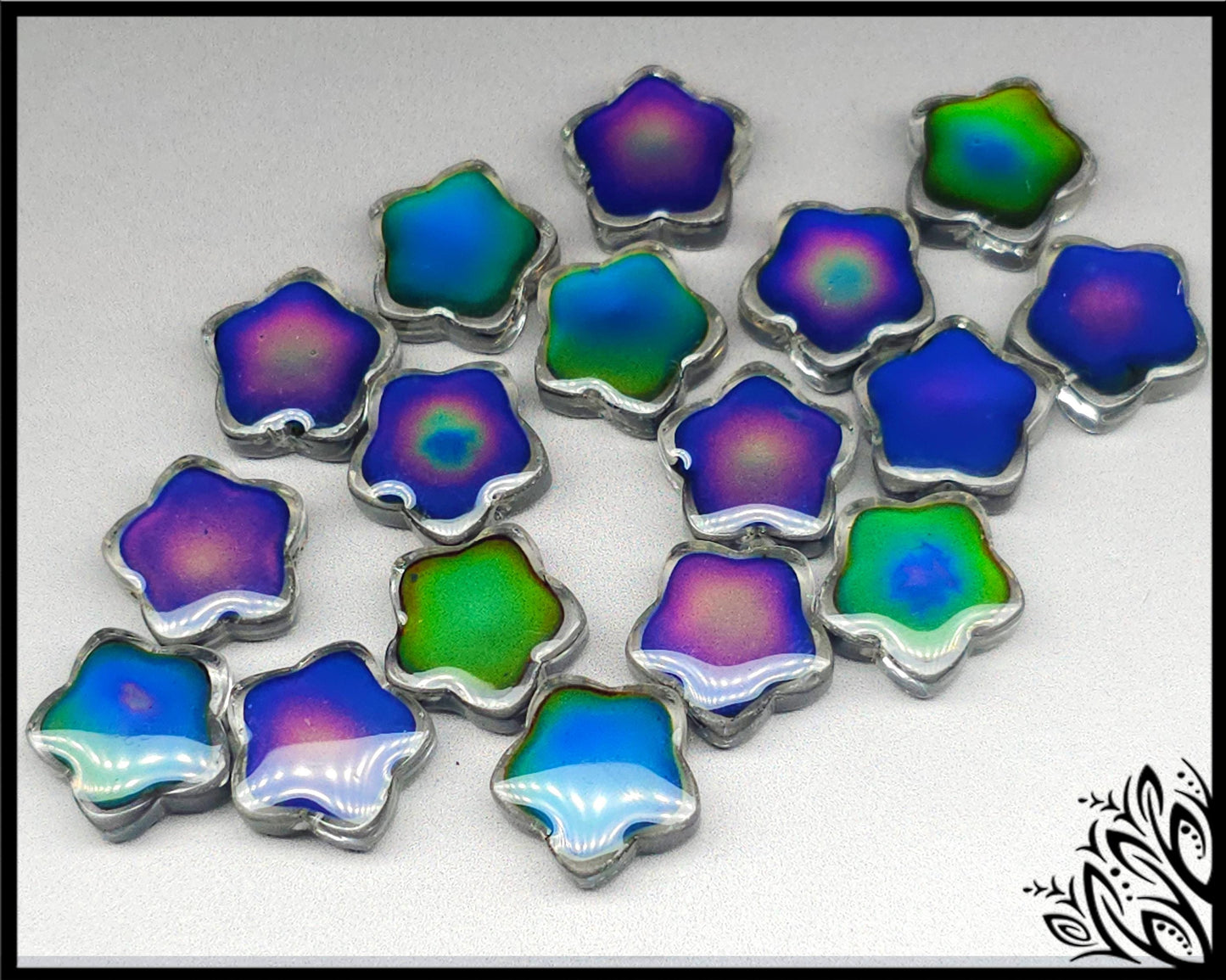 Mood stone - star beads - 14 mm - clear