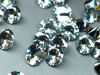 Cubic zirconia - smokey quartz - 8 mm - round faceted cut