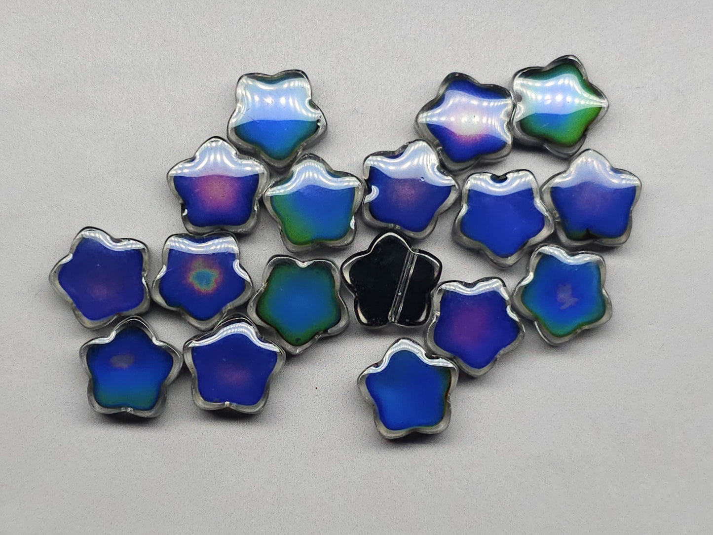 Mood stone - star beads - 14 mm - clear