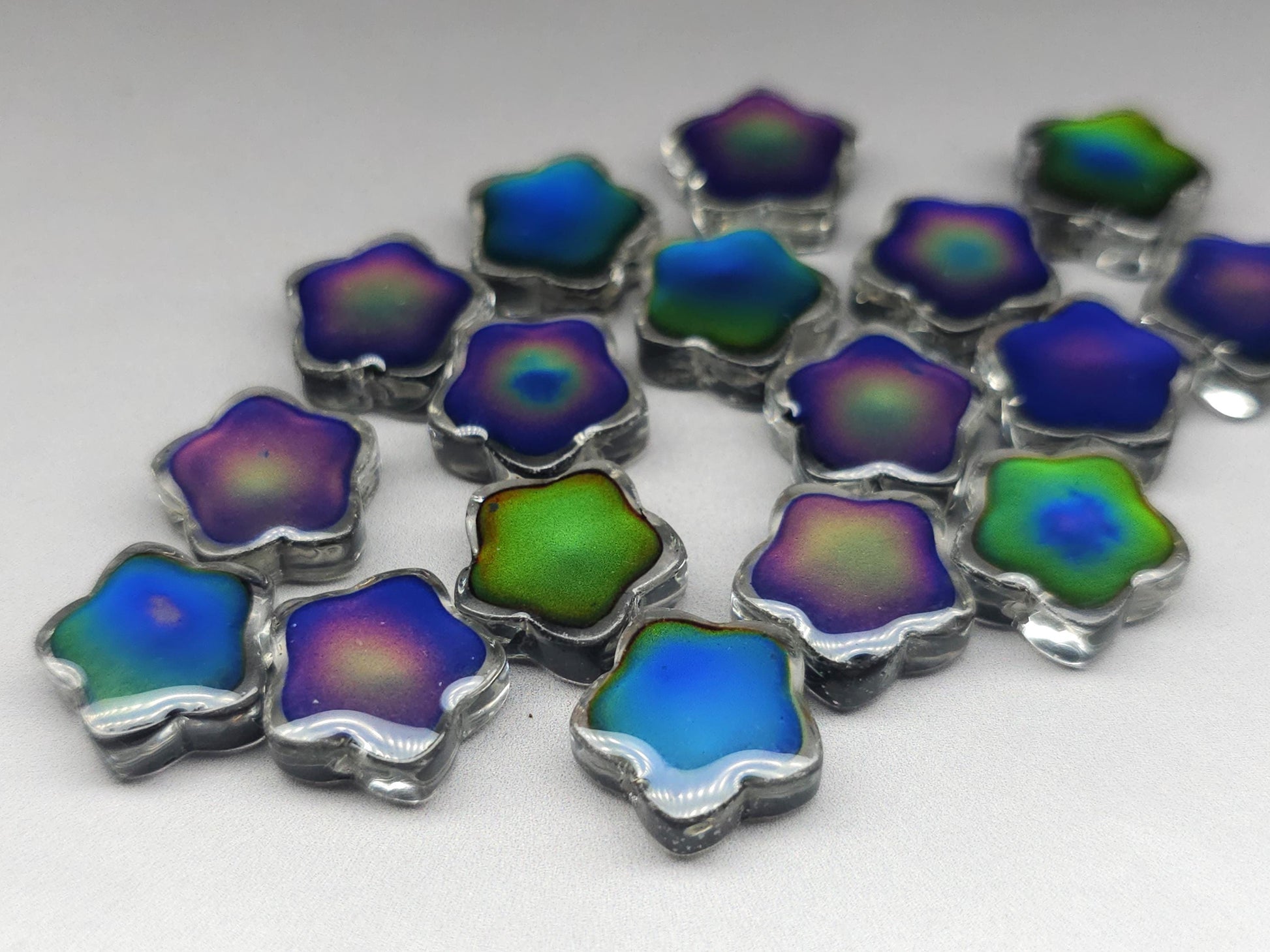 Mood stone - star beads - 14 mm - clear