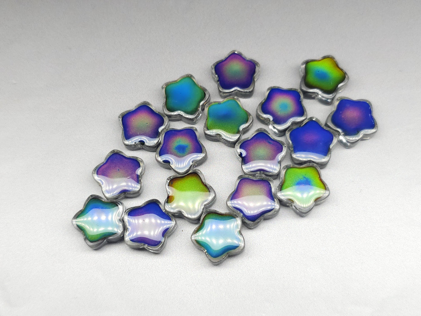 Mood stone - star beads - 14 mm - clear