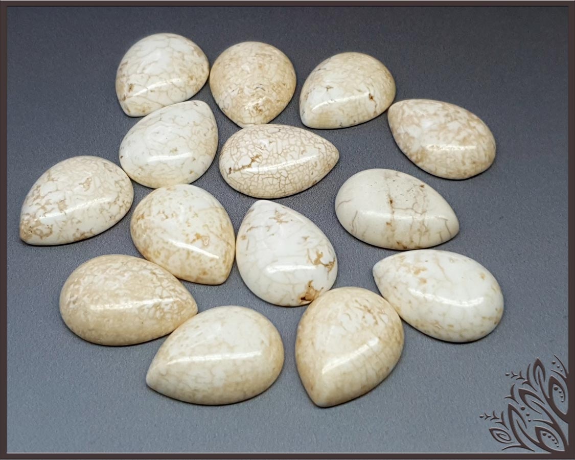White magnesite cabochon - pear - 22 mm